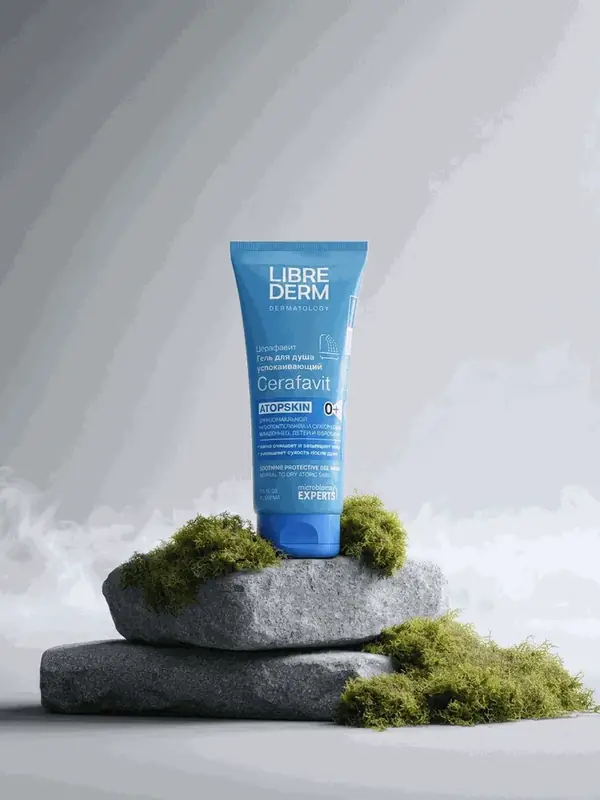 Shower gel on mossy stones product photography